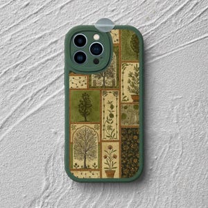 May include: A dark green smartphone case featuring a multi-panel collage design. The pattern displays various rectangular sections with illustrations of trees, potted plants, and floral motifs in shades of olive green, beige, and dark brown.
