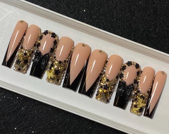 Black & gold bling French v-tip nails