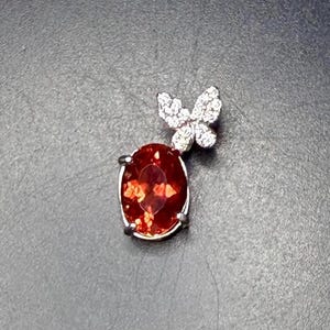 Orange-Red Oval Butterfly Sapphire Pendant 3.5CT.