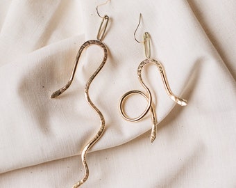 Mismatched Statement Snake Dangles. Brass earrings. Long Snake Dangles. Statement Earrings. Gold fill hooks.