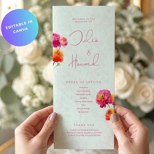 May include: A vertical wedding program card with a pale green background, featuring pink and orange watercolor flowers. The text reads: Welcome to the wedding of Julia & Howard, Order of Service, and Thank You, with a list of ceremony events.