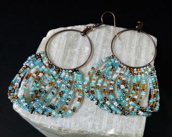 Antique copper hoop earrings with seed bead looped fringe  in shades of turquoise and copper