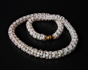 Frosted white and pale gold seed bead rope necklace with magnetic clasp