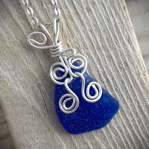 Sea Glass Necklace - Cobalt Blue Sea Glass Swirl Butterfly Wing Necklace - Sterling Silver Wire Wrap