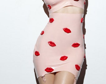 Latex Lingerie Hot Lips Skirt in Baby Pink with red 3D lips. Suspender grips.