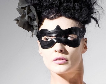Latex clothing. Black latex eye mask.