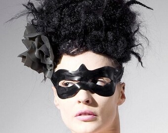 Latex clothing. Black latex eye mask.