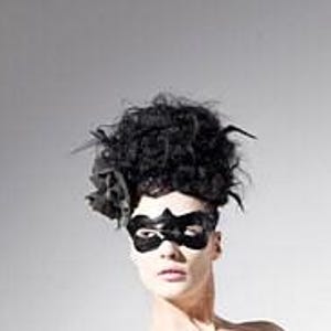 Latex clothing. Black latex eye mask. image 4