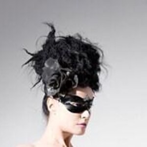 Latex clothing. Black latex eye mask. image 2