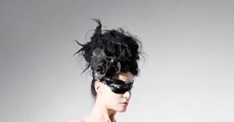 Latex clothing. Black latex eye mask. image 2