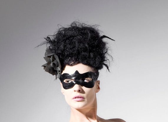 Latex clothing. Black latex eye mask.