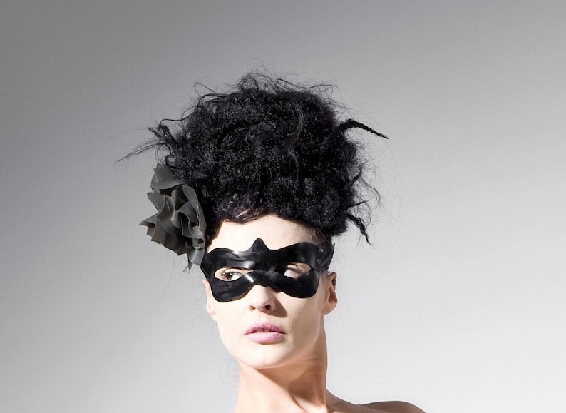 Latex clothing. Black latex eye mask. image 1