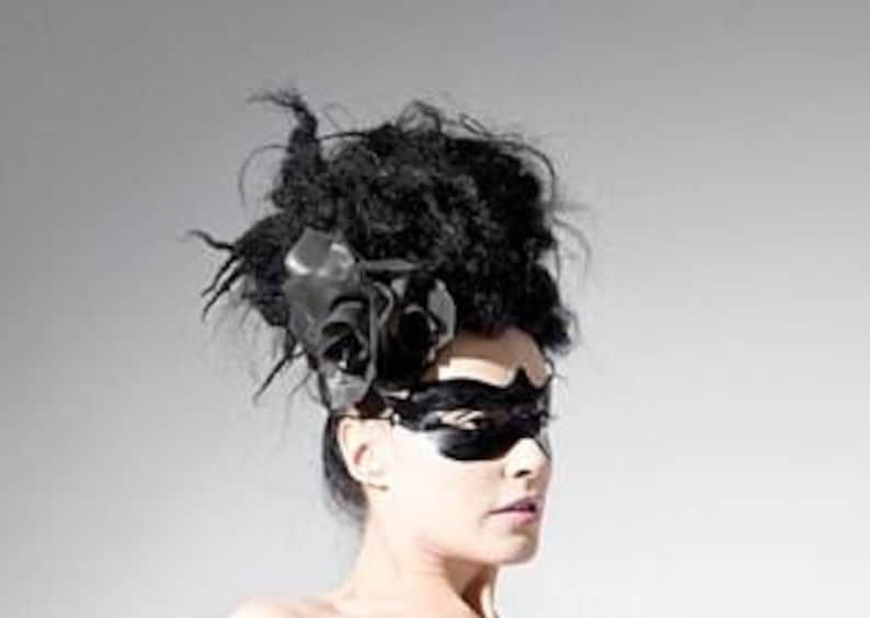 Latex clothing. Black latex eye mask. image 3
