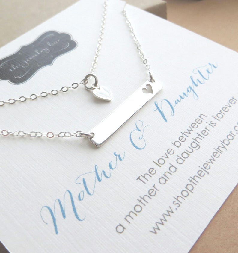 mother daughter bar necklace with heart cutouts set.
