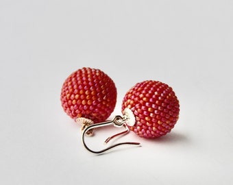 beaded globe earrings pink