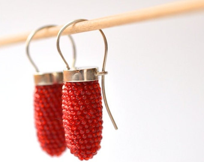 dangle earrings salmon red, silver bezel settings silver hooks, glass beads