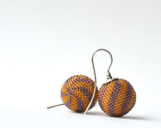 globe earrings lila mustard  twisted