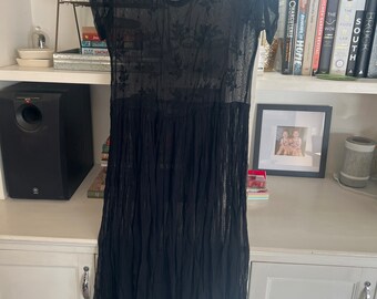 Dreamy Black dress with embroidered bodice. Size is M-L