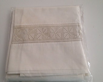 A pair of beautiful antique vintage tan pillowcases