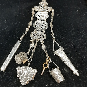 Elegant Victorian Sterling Silver Chatelaine: Antique Sewing Accessory with Attachments