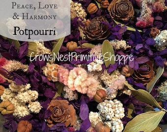 May include: A purple, brown, and white potpourri mix with dried flowers, leaves, and pine cones. The text "Peace, Love & Harmony Potpourri" is written on a white background.