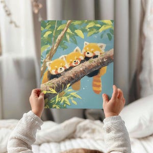 May include: Three red pandas are cuddling on a tree branch. The pandas are orange and white with black markings. The background is a blue sky with green leaves.