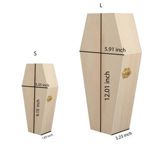 May include: Two wooden coffin-shaped boxes, one small and one large, are displayed. The small coffin measures 6.10 inches tall, 3.35 inches wide, and 1.85 inches deep. The large coffin is 12.01 inches tall, 5.91 inches wide, and 3.23 inches deep.