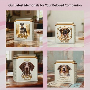 May include: Four white square pet memorial urns with gold trim. Each features a dog portrait, a name, and dates. The text reads: Our Latest Memorials for Your Beloved Companion, King 2013-2026, LoLa 2017-2026, Holly 2016-2026, and Teagan 2009-2026 Forever in my heart.