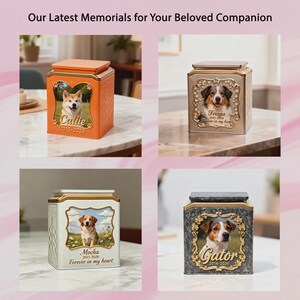 May include: Four square pet memorial urns with lids, each featuring a central portrait of a dog, a decorative gold-toned frame, and personalized text including names and dates. The urns are orange, metallic silver, white, and dark gray marble.