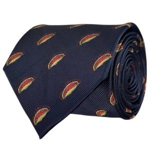 May include: A navy blue necktie featuring a repeating pattern of small, embroidered Venus flytrap motifs. Each motif displays a yellow-green interior with red edges and dark brown cilia, set against a textured, diagonal ribbed fabric background.