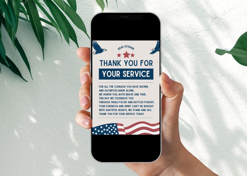 May include: A digital phone screen displaying a thank you card for veterans. The card features a blue and red American flag with stars and the text "DEAR VETERAN THANK YOU FOR YOUR SERVICE". The text below the flag reads "FOR ALL THE COURAGE YOU HAVE SHOWN, AND SACRIFICES MADE ALONE, WE HONOR YOU, BOTH BRAVE AND TRUE, THIS DAY WE CELEBRATE YOU. THROUGH TRIALS FACED AND BATTLES FOUGHT, YOUR STRENGTH AND SPIRIT CAN'T BE BOUGHT WITH GRATEFUL HEARTS, WE STAND AND SAY, THANK YOU FOR YOUR SERVICE TODAY."