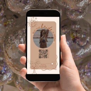 May include: A smartphone displays a digital invitation card with a tan background. The card features the text "Buy the Bride a Drink" around a central image of a person in a brown outfit. A QR code and event details are also visible.