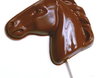 Têtes de chevaux en chocolat. Choisissez du chocolat au lait, noir, blanc ou coloré. Emballé individuellement.