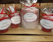 Red Apple Peel scented pillar with 3 large votives
