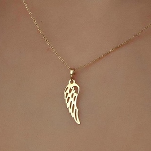 Halsband med änglavinge i 14 karat massivt guld: Minimalistisk vinge, elegant skyddsberlock