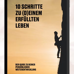 May include: A digital tablet screen displaying a motivational poster with the text "10 Schritte zu (D)einem erf&uuml;llten Leben" and "Der Guide zu deiner pers&ouml;nlichen Weiterentwicklung". The poster features a silhouette of a person rock climbing.