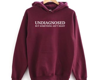 Undiagnosed But Something Ain't Right Sweatshirt-Hoodie, Funny Mental Health Sweatshirt, Quirky Self-Awareness Apparel Gift