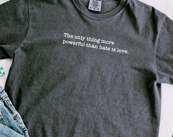 The Only Thing More Powerful Than Hate Is Love | Boxy or Baby Crop Women's T-Shirt | Benito SuperBowl Billboard Message | FDT Anti-Ice Tee