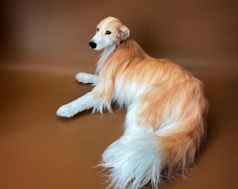 The toy is a realistic dog. Fur toys. Realistic toys. The Russian greyhound.