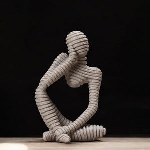 Ribbed Thinker Statue – Sandstone-Look Minimalist Sculpture
