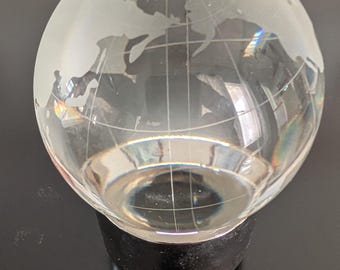 Vintage glass paperweight of the world etched beautiful glass globe