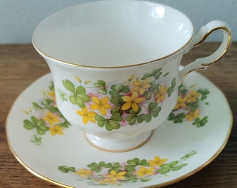 Vintage Queen Anne Shamrock Clover English tea cup and saucer in the pattern gorgeous yellow flowers