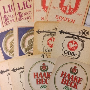 12 Vintage beer coasters Heileman Spaten German Gilde bar ware beer collectables