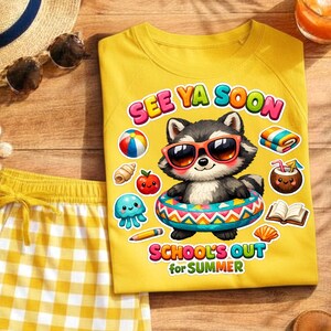 May include: Yellow t-shirt with a raccoon wearing sunglasses and an inner tube, with the text "SEE YA SOON" and "SCHOOL'S OUT for SUMMER". The shirt is paired with yellow and white checkered shorts. Summer-themed apparel.