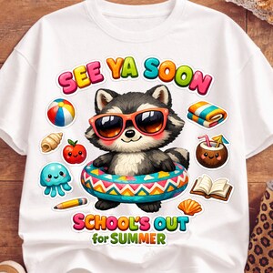 May include: White t-shirt featuring a cartoon raccoon wearing sunglasses and an inner tube. The shirt has the text "SEE YA SOON" and "SCHOOL'S OUT for SUMMER" in colorful bubble letters. Beach-themed graphics surround the raccoon.