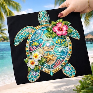 May include: Black canvas featuring a bejeweled sea turtle design. The turtle's shell is adorned with turquoise, blue, and gold gems, with a central pearl and starfish. Tropical flowers and ocean life details complete the artwork.