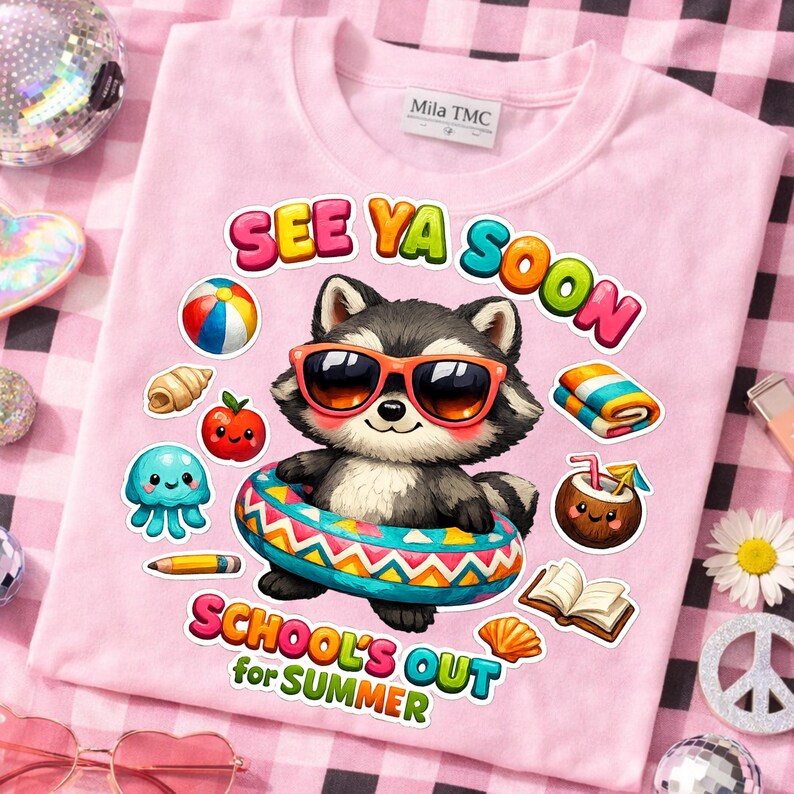 May include: Pink t-shirt with a graphic of a raccoon wearing sunglasses and a swim ring. The shirt has the text "SEE YA SOON" and "SCHOOL'S OUT for SUMMER". Additional graphics include a beach ball, apple, and a coconut drink.