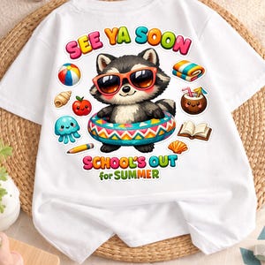 May include: White t-shirt featuring a cartoon raccoon wearing sunglasses and an inner tube. The shirt has the text "SEE YA SOON" and "SCHOOL'S OUT for SUMMER" in colorful bubble letters. Beach-themed graphics surround the raccoon.