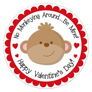 May include: A round Valentine's Day sticker featuring a cartoon monkey face with a smiling expression. The sticker has a red scalloped border and includes the text "No Monkeying Around...Be Mine! Happy Valentine's Day!" with red hearts.