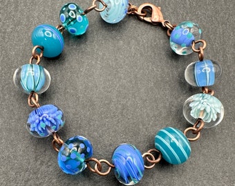 Solid copper and blue lampwork glass bead 'The Blues' bracelet